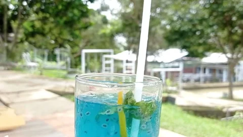 Drinking a refreshing drink after work Stock Footage 151023307