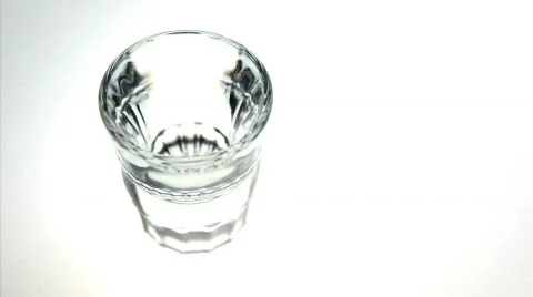 Drinking a shot glass full of tequila Stock Footage