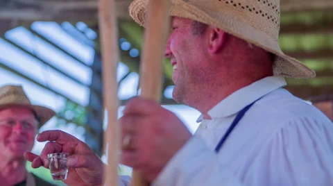 Drinking spirits for restoring power to work Stock Footage 54343780