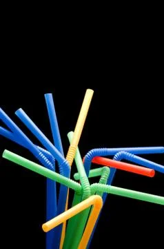 Drinking straw on black Foto stock