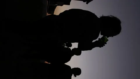 Drinking at Sunset Stock Footage 234678661