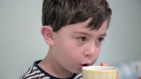 Drinking tea and chewing close up Stock Footage 54035351