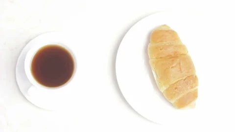 Drinking Tea with Croissant Stop Motion Stock Footage 95253277