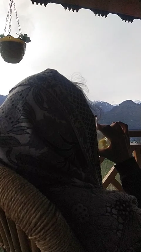 Drinking tea on front of mountain view Stock Footage 238741809