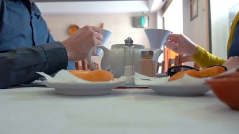 Drinking tea in the restaurant in 4K Stock Footage 75848440