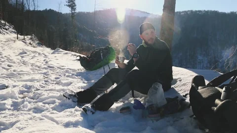 Drinking tea in the winter mountains. Sunny day. Carpathians. Borzhava. Stock Footage 168467755