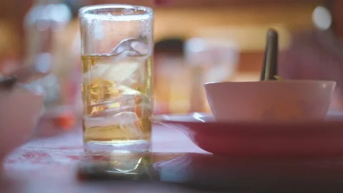 Drinking Thai whiskey mixed with soda water and ice Video stock 117289845