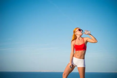 Drinking water from bottle Stock Photos