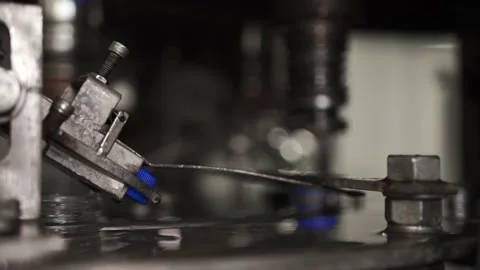 Drinking water bottling production. Screws the plastic cap onto the bottle. Stock Footage 162760281
