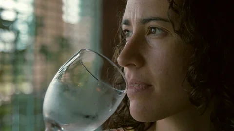 DRINKING WATER FROM GLASS CUP Stock Footage 74642616