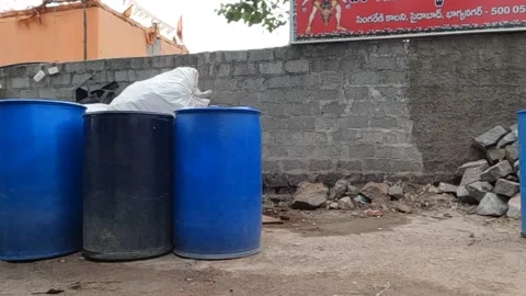Drinking water kept in containers for people living in slum areas Stock Footage 213205697
