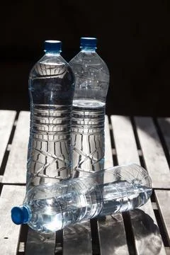 Drinking water in plastic bottles Stock Photos