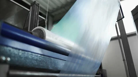 Drinking water production. Bottles packed with polyethylene sending supermarket Stock Footage 162974840