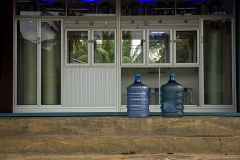 Drinking water refill in the photo from the front. Stock Photos