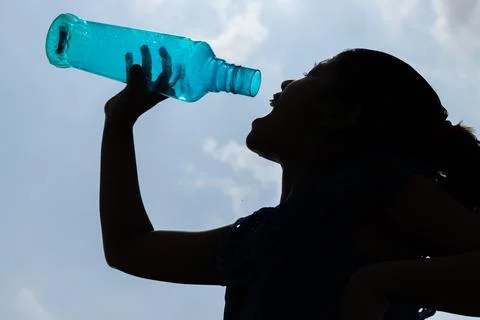 Drinking water in summer Stock Photos
