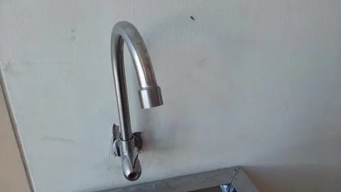 Drinking water tap in the wall Stock Footage 284442876