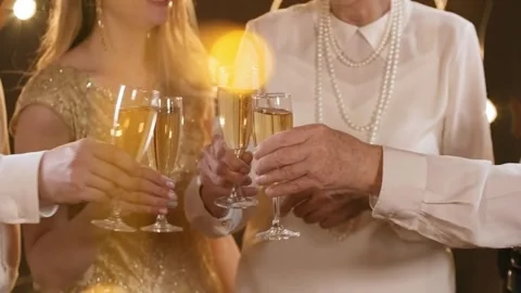 Drinking wine in a bar or at home, celebrating, happily friendship, togetherness 库存影片 336580510