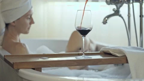 Drinking wine in bath tube. Stock Footage 162682205