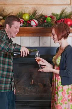 Drinking Wine By The Fireplace Foto stock