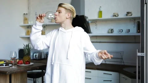 Drinking wine handsome dancing guy Vídeo Stock 117851918