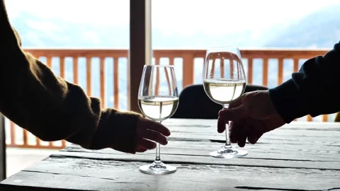 Drinking wine.Glasses with wine in hands. Romantic dinner for two. Stock Footage 246979809