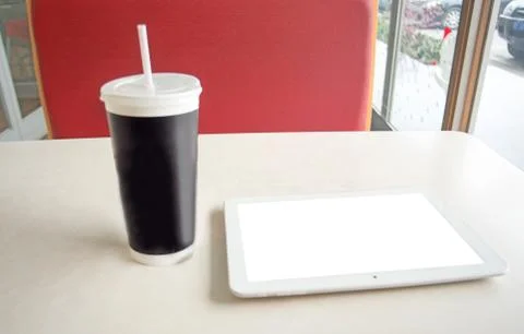 Drinks and tablets Stock Photos