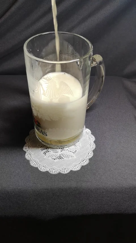 Drinks are poured into a glass. Stock Footage 227746756