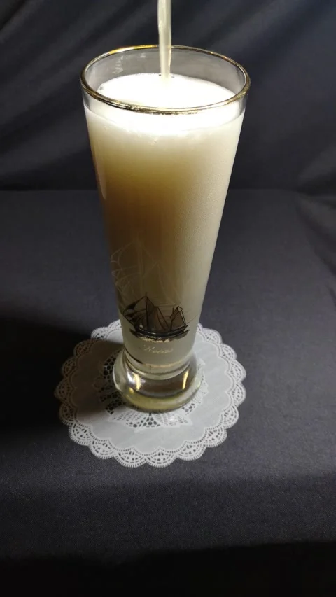 Drinks are poured into a glass. Stock Footage 227747004
