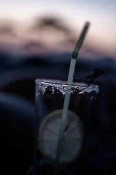 Drinks at the beach at sunset Stock Photos