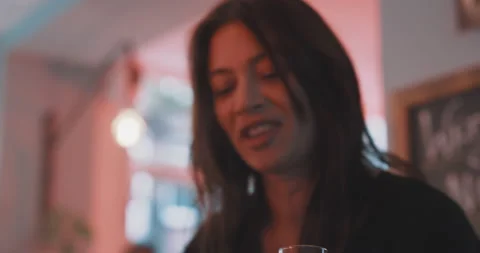 Drinks being served with a smile by the waitress Stock Footage 203583008