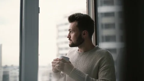 Drinks coffee at home2 Stock-Footage 129463990