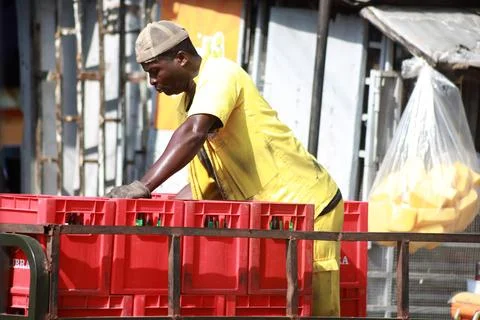 The drinks delivery man Stock Photos