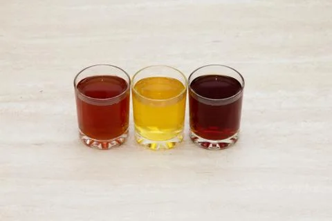 Drinks of different colours Stock Photos