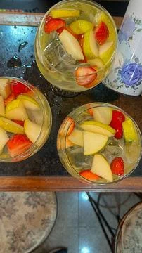 Drinks with wine and fruit Stock Photos