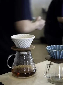 Drip coffee brewing in cafe. Stock Photos
