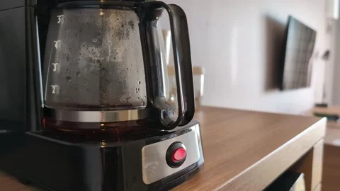 Drip coffee machine making coffee in hotel room Stock Footage 341324899