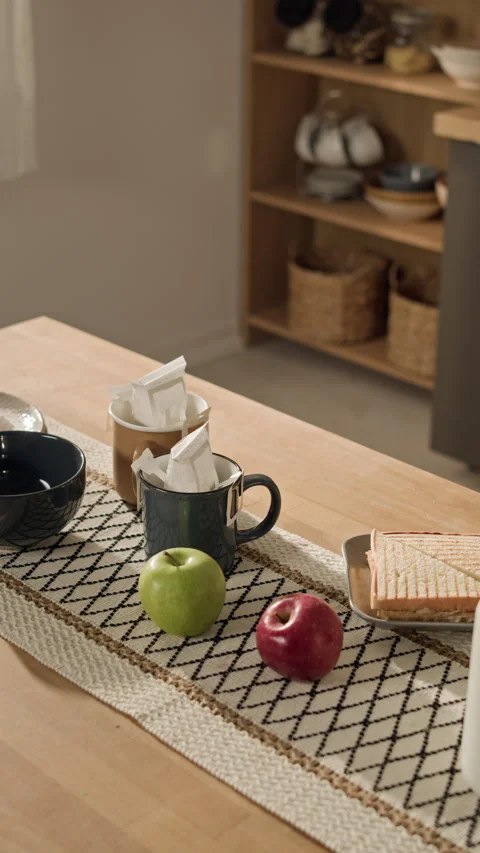 Drip Coffee Mugs with Fresh Apples Served on Breakfast Table Stock Footage 338080921