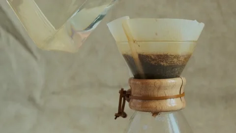 Drip coffee process. Close up of pouring coffee drops,making morning beverage Stock Footage 140206275