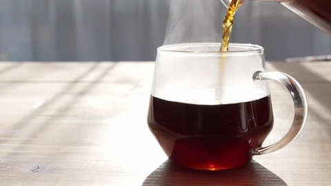 Drip coffee scene of pouring coffee into a cup Stock Footage 296524007