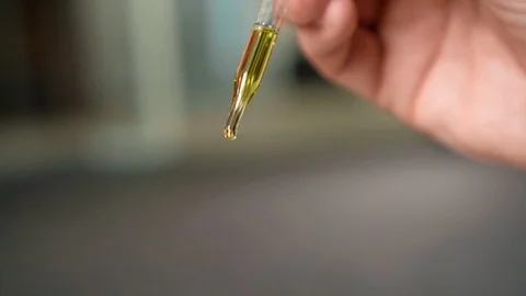 Drip drop from pipette. Close-up video. Medical and chemistry laboratory Stock Footage 123979439