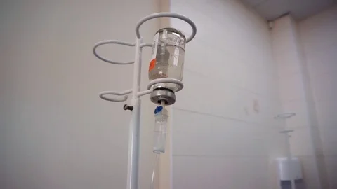 Drip drop with saline or glucose,Infusion bottle with  solution Stock Footage 85294931