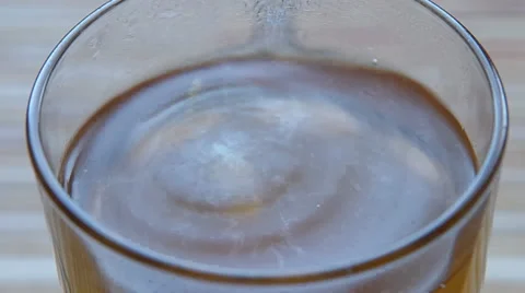 Drip Propolis tincture in tea Stock Footage 36782186