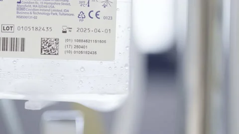 Drip saline solution infusion at hospital certified from eu with bar code 스톡 동영상 229094338