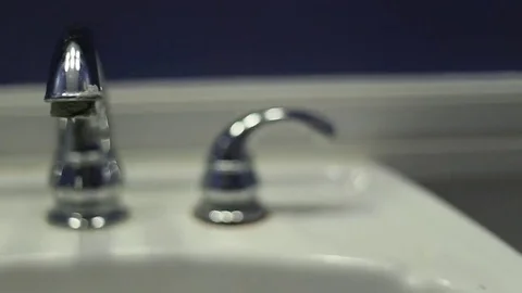 Dripping Bathroom Faucet Stock Footage 69078903