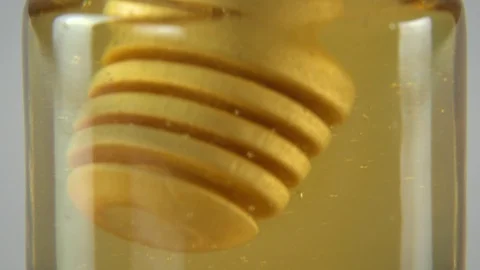 Dripping honey white backround Stock Footage 83039532