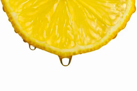 A dripping lemon slice Stock-Fotos