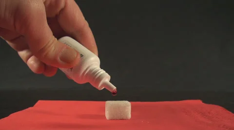 Dripping Medicine On A Sugar Cube Close Up-Shot Stock Footage 34609684