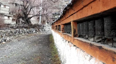 Dripping melted snow on old prayer wheels Stock Footage 67646689