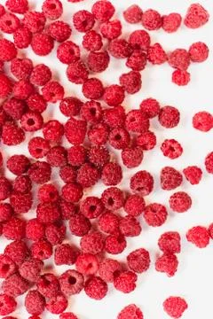 Dripping raspberry on white background. Foto stock