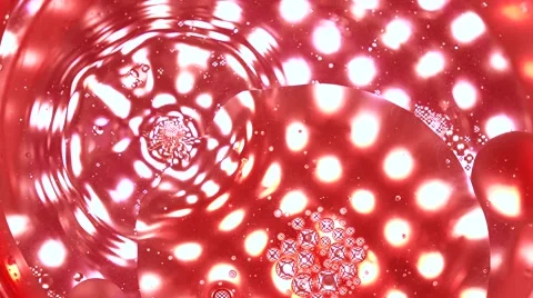 Dripping red liquid with pipette in red solution against multiple spot lights Stock Footage 68333874